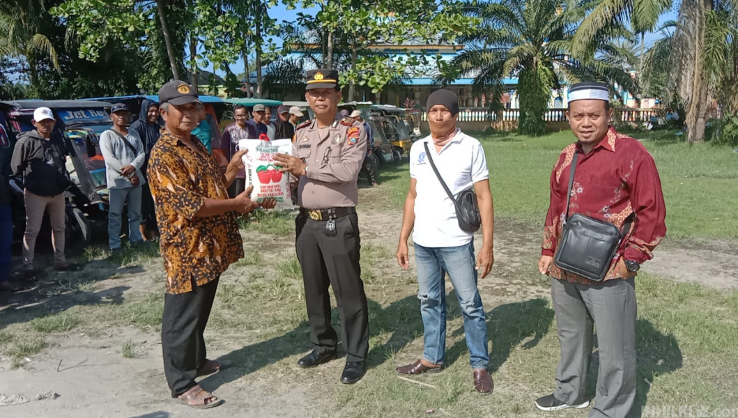 Polsek Tanjung Beringin Berikan Bantuan kepada Abang Becak