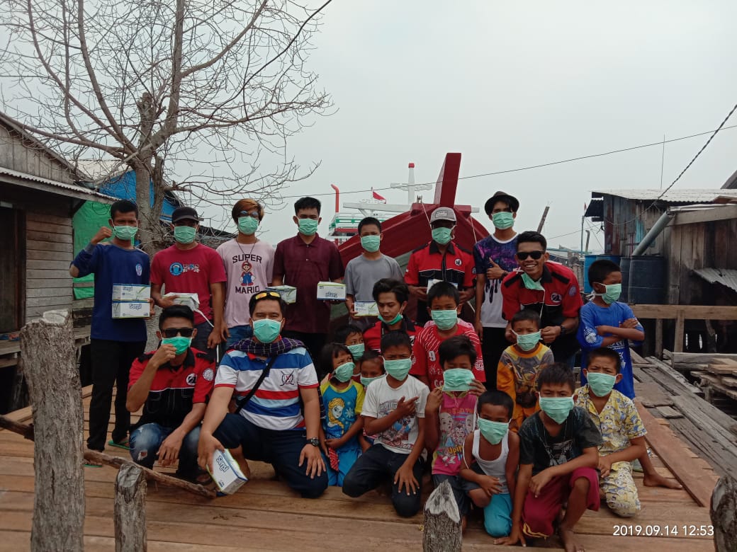 Oi Tanah Merah Bagi-bagi Masker untuk Masyarakat