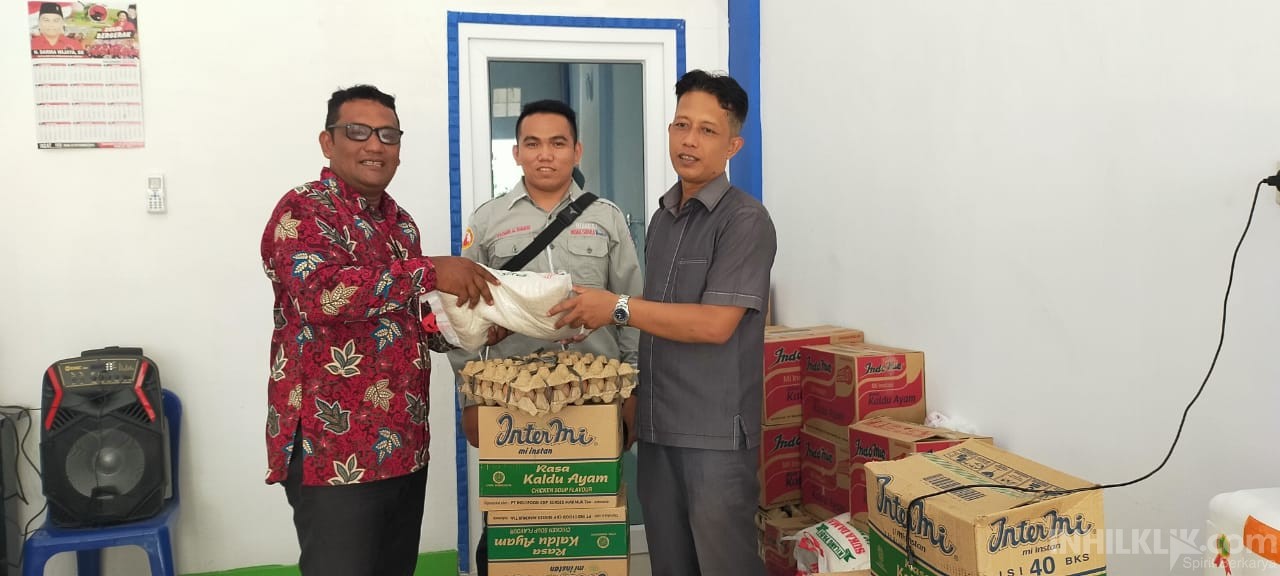 Peduli Dampak Covid-19, Kades Bagan Kuala Serahkan Paket Sembako