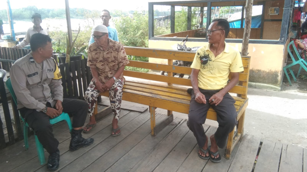Bhabinkamtibmas Desa Teluk Merbau Aiptu Heriyanto Cooling System Sosialisasikan Pemilu Damai