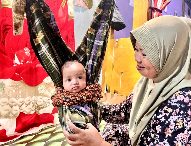 Ayun Bapukung: Warisan Budaya Suku Banjar di Indragiri Hilir yang Ternyata Bermanfaat Bagi Kualitas Tidur Bayi