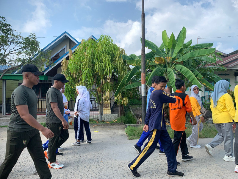 Babinsa Koramil 06/Kateman Ikuti Jalan Santai Rangka Deklarasi Damai Pilkada