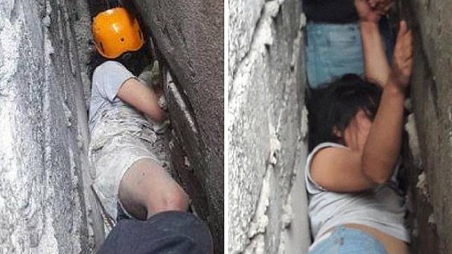 Mabuk! Wanita Ini Terjatuh di Antara Tembok yang Super Sempit