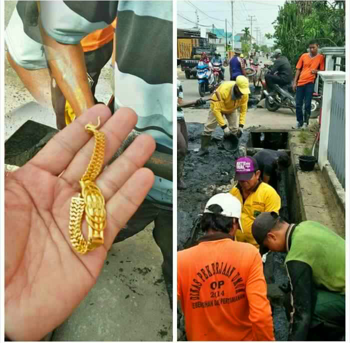 Bersihkan Saluran Drainase Di Jalan Gunung Daek Tembilahan, Pasukan Kuning Temukan Emas 34 Gram