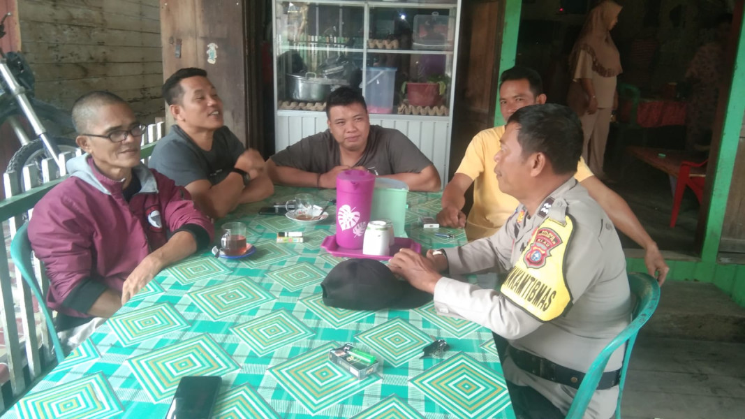 Aiptu Heriyanto Sosialisasi Pemilu Damai 2024 kepada Warga Desa Teluk Merbau
