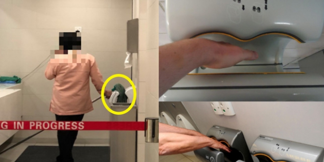 Petugas Kebersihan Mal Keringkan Pel di Mesin Pengering Tangan