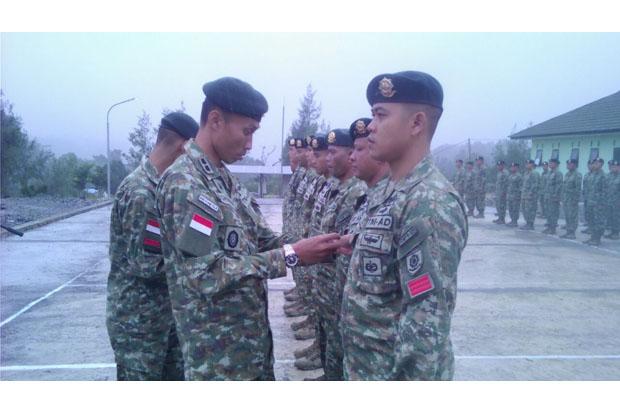 Ditengah Guyuran Hujan, 53 Prajurit Penjaga Perbatasan RI-Timor Leste Naik Pangkat
